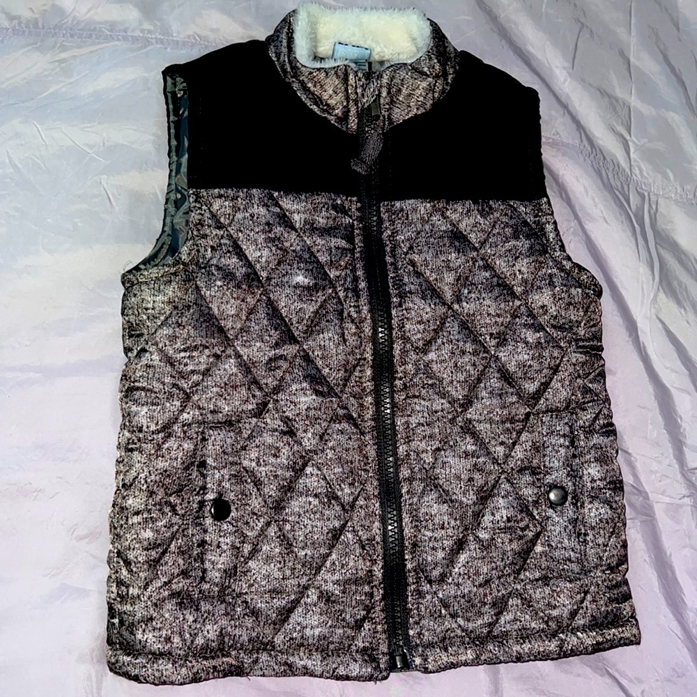 Very cute and warm vest from a non smoker, no pets home.